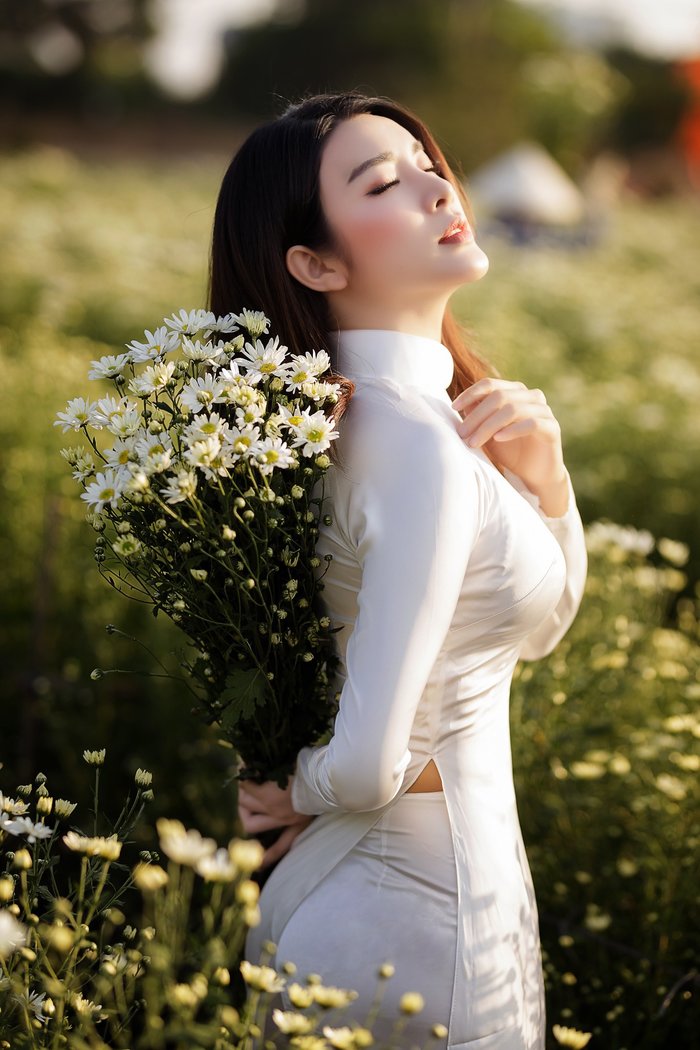 me-man-ve-dep-diu-dang-cua-a-hau-yan-my-voi-ao-dai-trang (7)